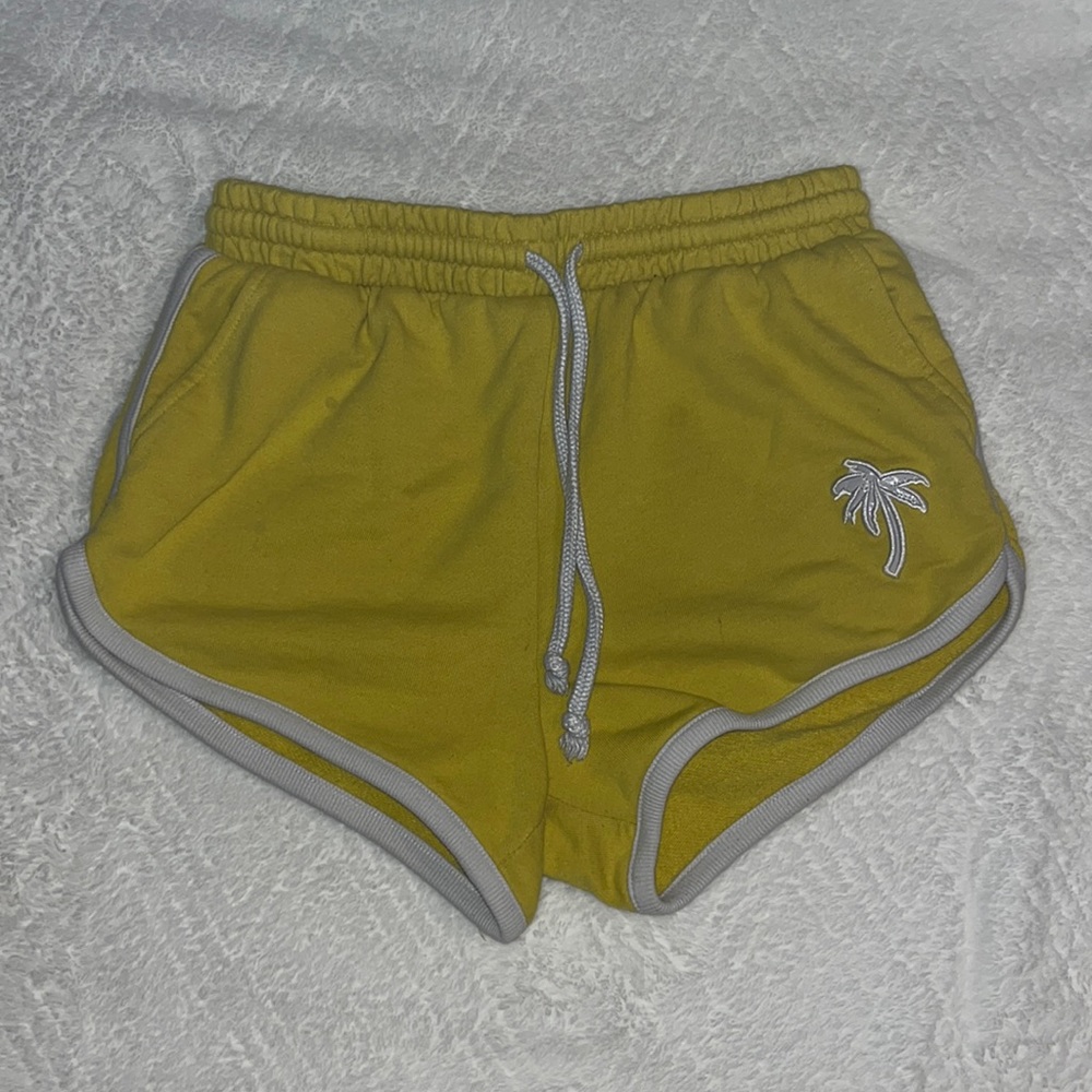 Size S, yellow, FOREVER 21 brand, palm tree shorts w/drawstring.